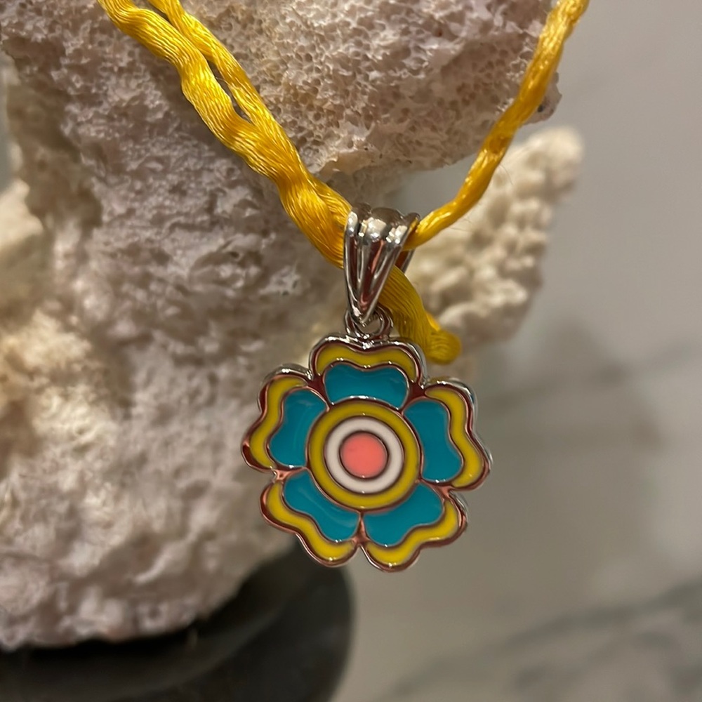 Silver tone metal flower charm